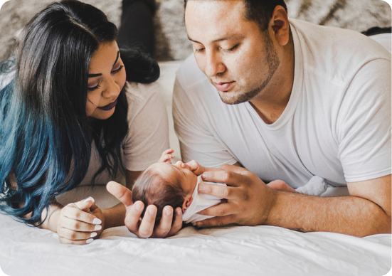 Parents looking at their baby