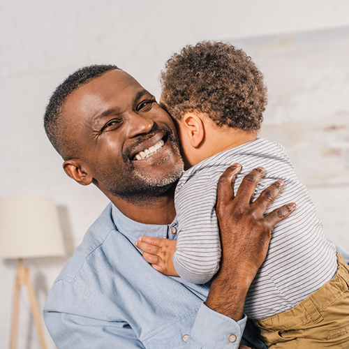 Adult holding child