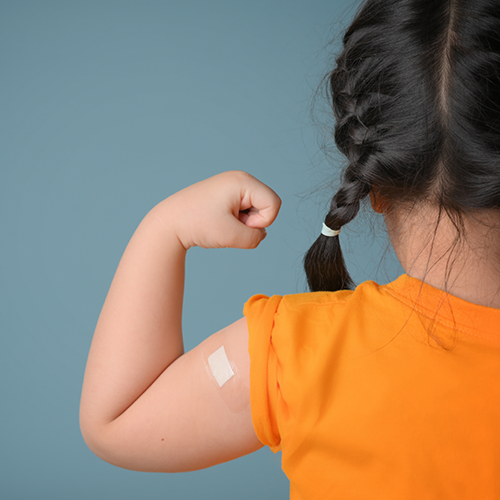 Child with arm bandage