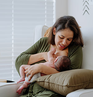 Mother breastfeeding baby