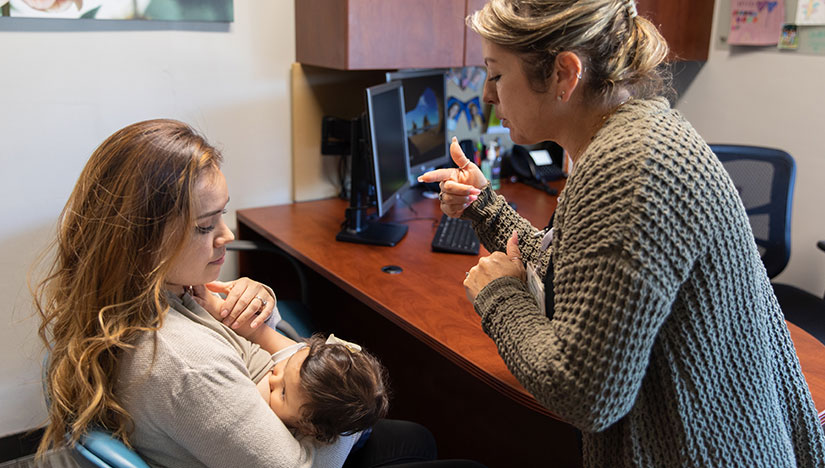 Counselor talking to mother